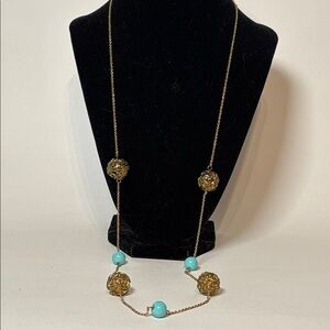 Long strand Gold tone chain with sphere ball and Turquoise bead 34”